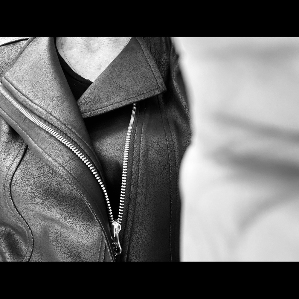 Faux leather. Light weight. Hand wash.